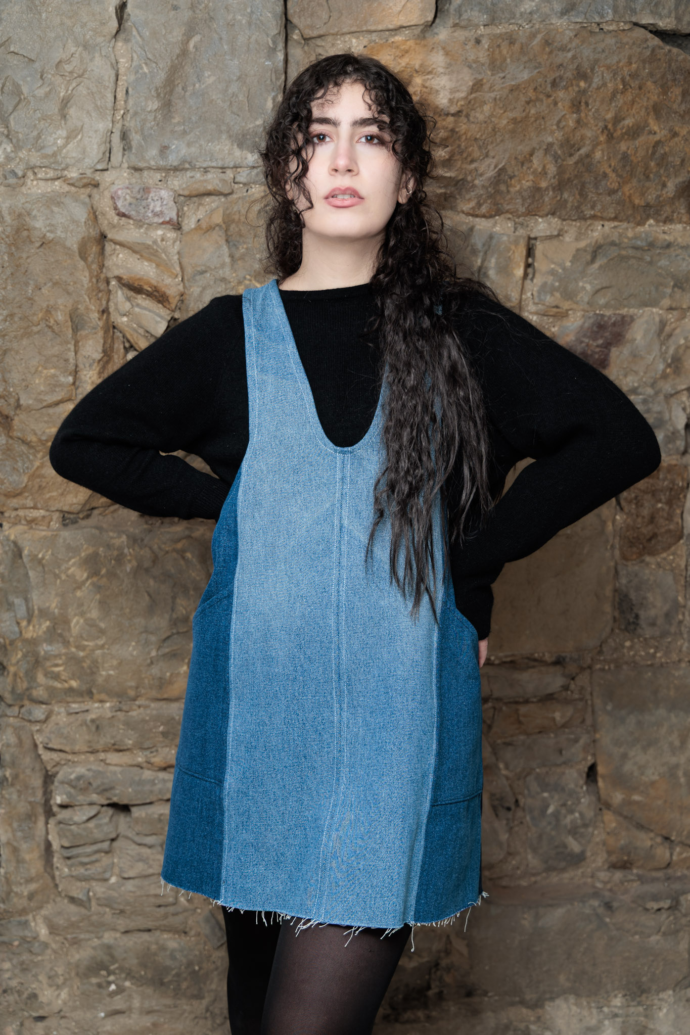 A female model wearing a Bluebell Dress with a black top