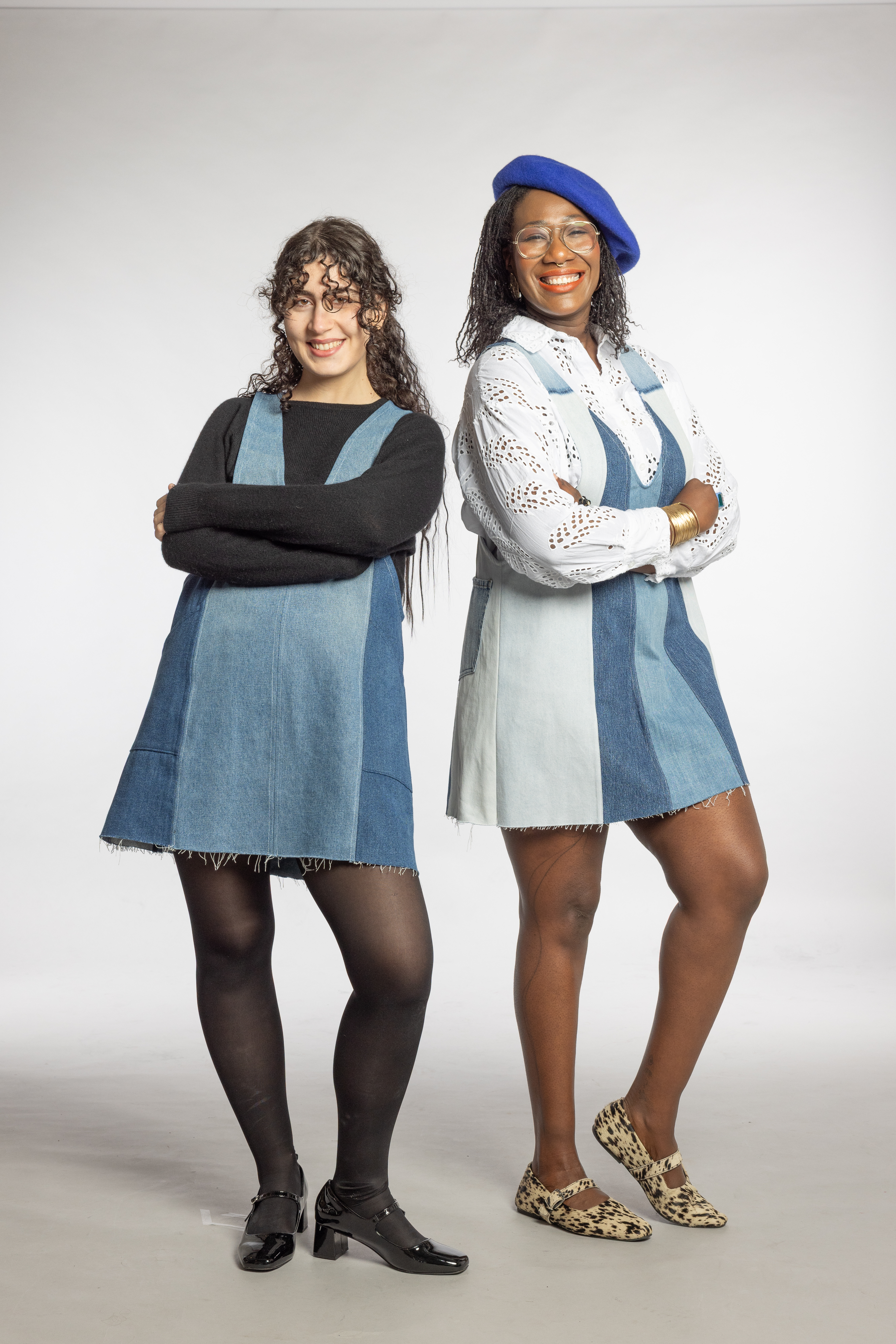Two models wearing bluebell dresses with different top styles